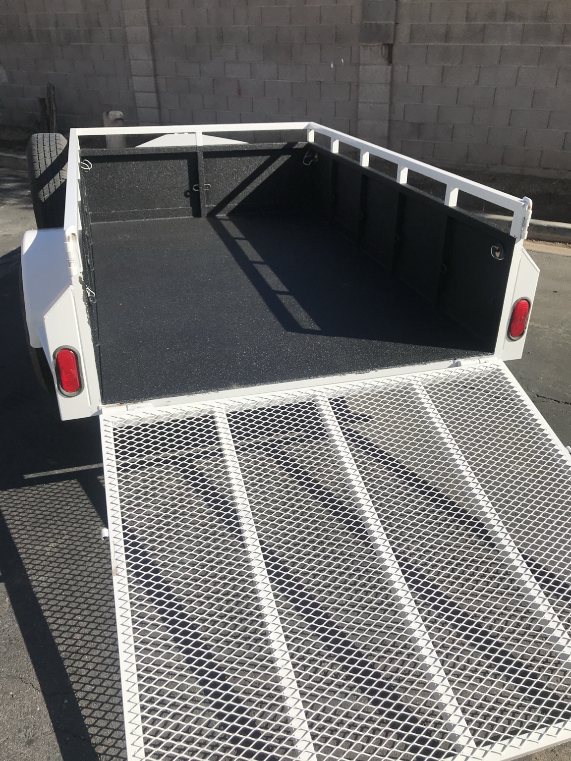 White pickup with coated bed