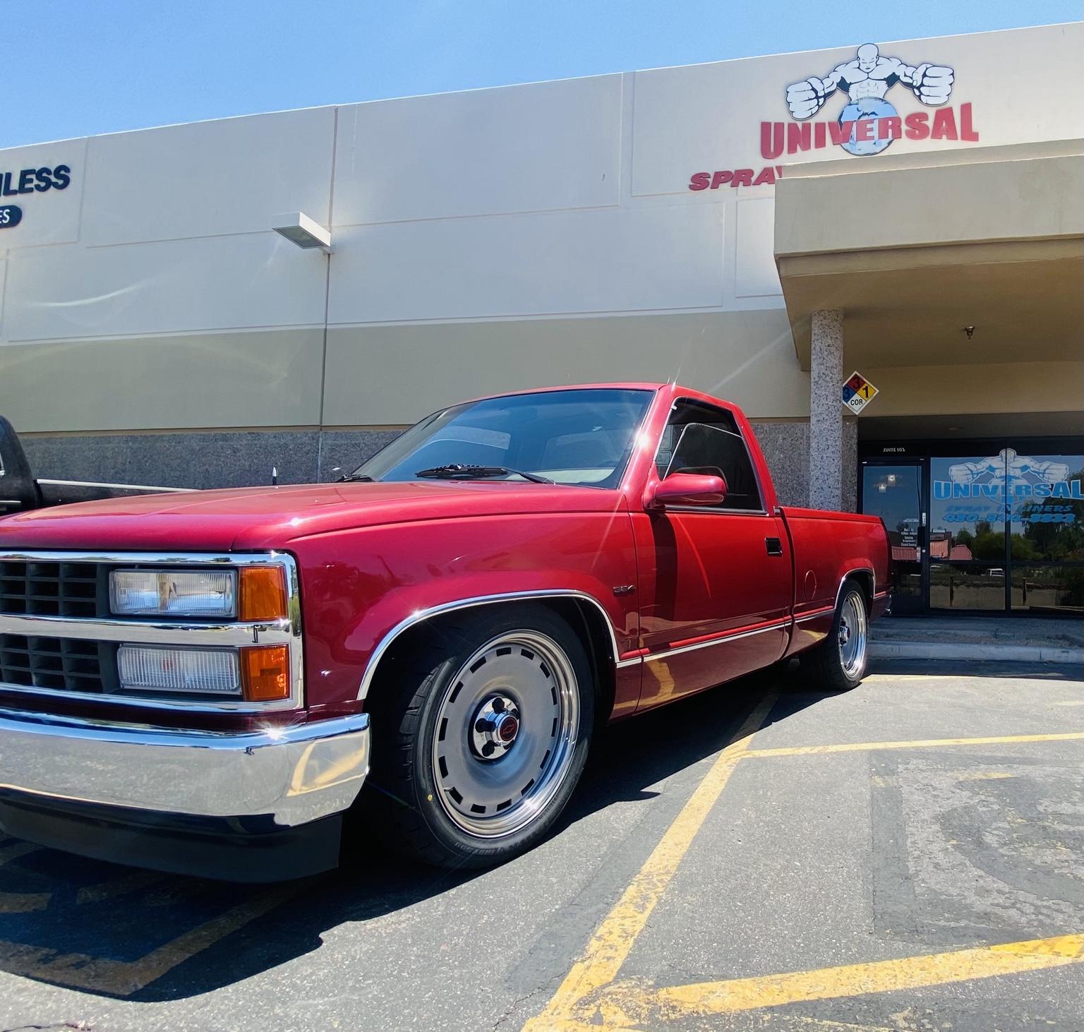 Red truck outside Universal Linings
